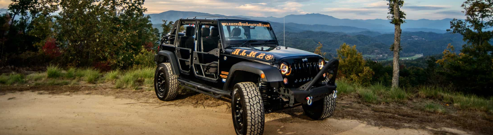 jeep with mountains in background