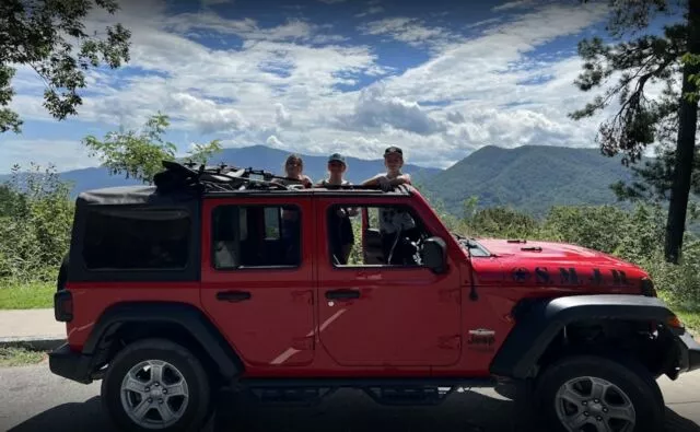 jeep in front of mountains