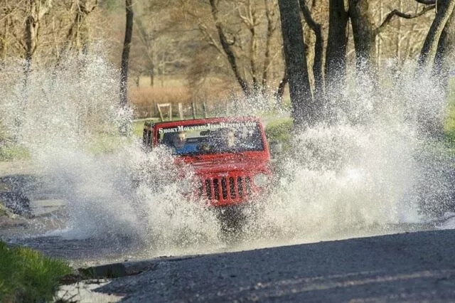 jeep driving through water